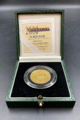 The Royal Mint 2000 Suriname Millennium Gold Proof 125,000 Gulden coin, boxed with certificate