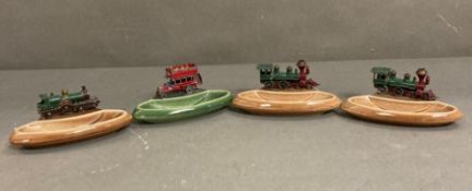 A selection of four Vintage RK product by Wade with trains and a bus.