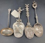A selection of four antique silver caddy spoons