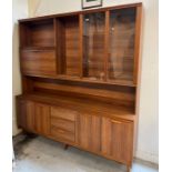 A Mid Century wall unit with glazed cupboard, drink cabinet, drawers and cupboards below (H200cm