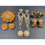A selection of quality costume jewelry to include a pair of Christian Dior clip on earrings and a