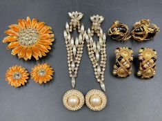A selection of quality costume jewelry to include a pair of Christian Dior clip on earrings and a