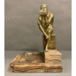 A Bronze in the manner of August Rodin with marble base.