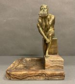 A Bronze in the manner of August Rodin with marble base.