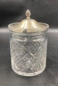 A hallmarked silver glass jam pot