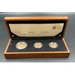 The Royal Mint The Sovereign 2012 Premium Three coin gold proof set, boxed with papers. A double