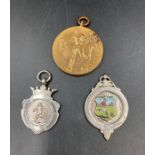 Two vintage silver football medallions and a bronze football medallion