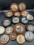 An assortment of framed and unframed Staffordshire pot lids
