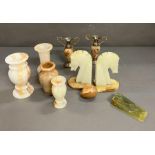 A selection of onyx, vase, door stop, etc