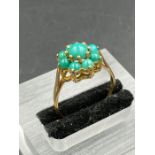 A 9ct gold ring with turquoise stones (Approximate Total Weight 3.2g) Size S