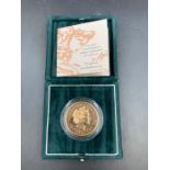 The Royal Mint 2000 United Kingdom Brilliant Uncirculated £5 Gold Coin. 22ct gold, Approximate Total