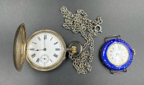 A silver pocket watch and a silver and enamel watch (Makers mark DBS)