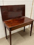 A mahogany tea table with hinged fold out extension (H74cm W92cm D45cm)