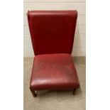 Mid Century side chair with red vinyl seat pads