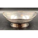A pierced silver bowl, 21cm in length, hallmarked for Sheffield 1919 by Atkin Brothers (