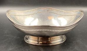 A pierced silver bowl, 21cm in length, hallmarked for Sheffield 1919 by Atkin Brothers (