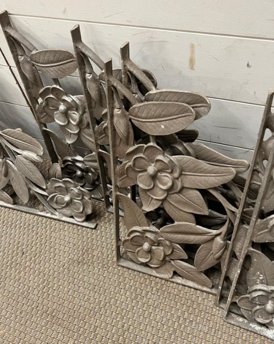 A set of eight cast iron wall brackets with floral theme - Image 3 of 3