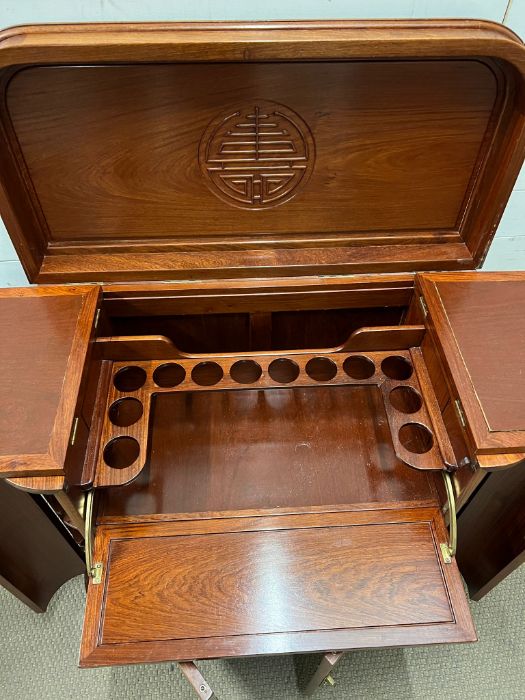 A chinese hardwood drinks cabinet opening up to a bar height 96cm depth 50cm width 96cm - Image 4 of 7