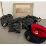 A selection of military caps and tank caps, various countries