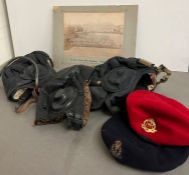 A selection of military caps and tank caps, various countries