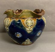 A Victorian Doulton Lambeth stone ware jardinière in blues, greens and browns