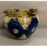 A Victorian Doulton Lambeth stone ware jardinière in blues, greens and browns