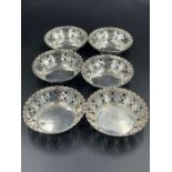 A set of six small pierced bowls, makers mark EJH and hallmarked for Birmingham 1927.