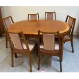 A Mid Century Nathan dining table with six chairs and centre leaf (H76cm W152cm D98cm)