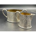 Hallmarked silver milk jug and sugar bowl by Alexander Macrae, London 1868.