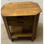 An oak octagonal cutlery table (H54cm W52cm D41cm)