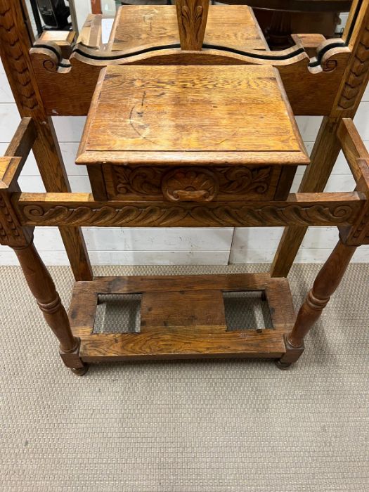 A carved hall stand with turned wooden hooks and mirror plate (H200cm W78cm D37cm) - Image 2 of 3