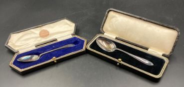 Two hallmarked silver teaspoons. cased.