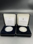 Two collectable silver coins Queen Elizabeth II Longest Reigning Monarch silver proof £5 coin and