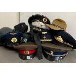 A selection of misc hats including reproduction military's hats