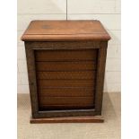 A Victorian mahogany collectors cabinet with a inlaid hinged door (missing glass) opening to eight