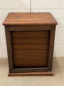 A Victorian mahogany collectors cabinet with a inlaid hinged door (missing glass) opening to eight