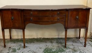 A Regency style sideboard with two drawers flanked with curved side cupboards (H93cm W200cm D63cm)
