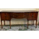 A Regency style sideboard with two drawers flanked with curved side cupboards (H93cm W200cm D63cm)