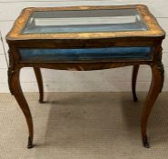 A Bijouterie display table inlaid bevel glass top and gilt bronze mounts (H74cm W74cm D47cm)