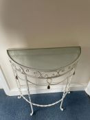 A Demi Lune wrought iron table with glass top (H74cm W62cm D26cm)