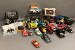 A selection of Diecast and plastic toy vehicles to include cars, bikes and aeroplane