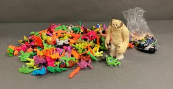 A large volume of figurines in moulded plastic, various styles, themes and years including a 1981