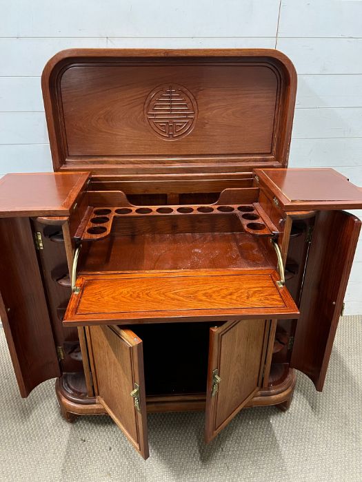 A chinese hardwood drinks cabinet opening up to a bar height 96cm depth 50cm width 96cm - Image 7 of 7