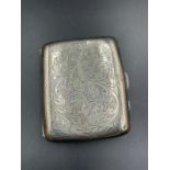 A silver cigarette case AF Birmingham 1920 by G & CL Ltd