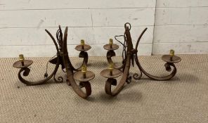 A pair vintage wrought iron three arm chandelier