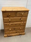 Two over four pine chest of drawers (H93cm W77cm D40cm)