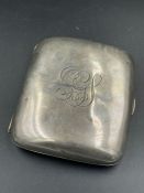 An engraved silver cigarette case by William Neale & Son, Birmingham 1918