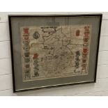 An engraved framed map of Cambridge flanked at the sides with coats of arms, engraved by William Kip