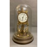 A brass glass domed 400 day clock