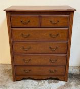 A contemporary chest of drawers (H110cm W88cm D42cm)